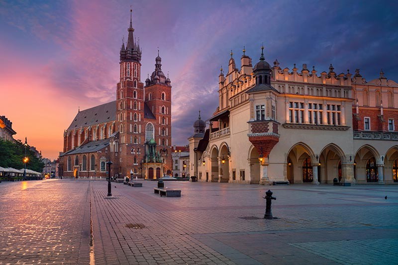 Obraz Kraków w pięknym świetle wschodzącego słońca - obrazy, fototapety, plakaty